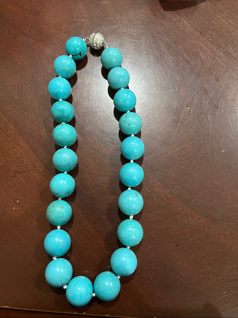 Turquoise Howlite stone beaded necklace with rhinestones closure. Never worn.